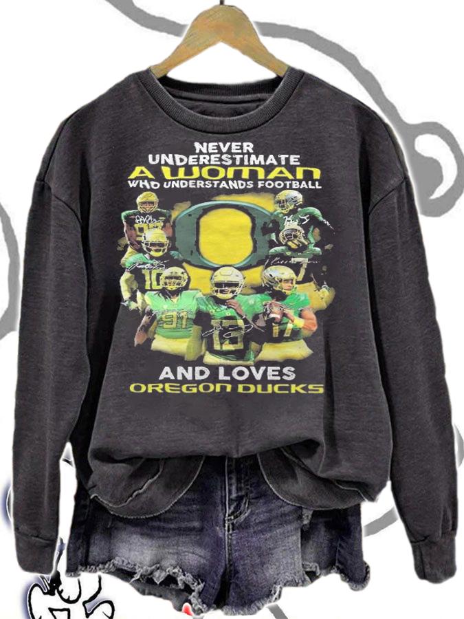 Never Underestimate A Woman Who Understands Baseball And Love Oregon Ducks Shirt t-shirt sweatshirt