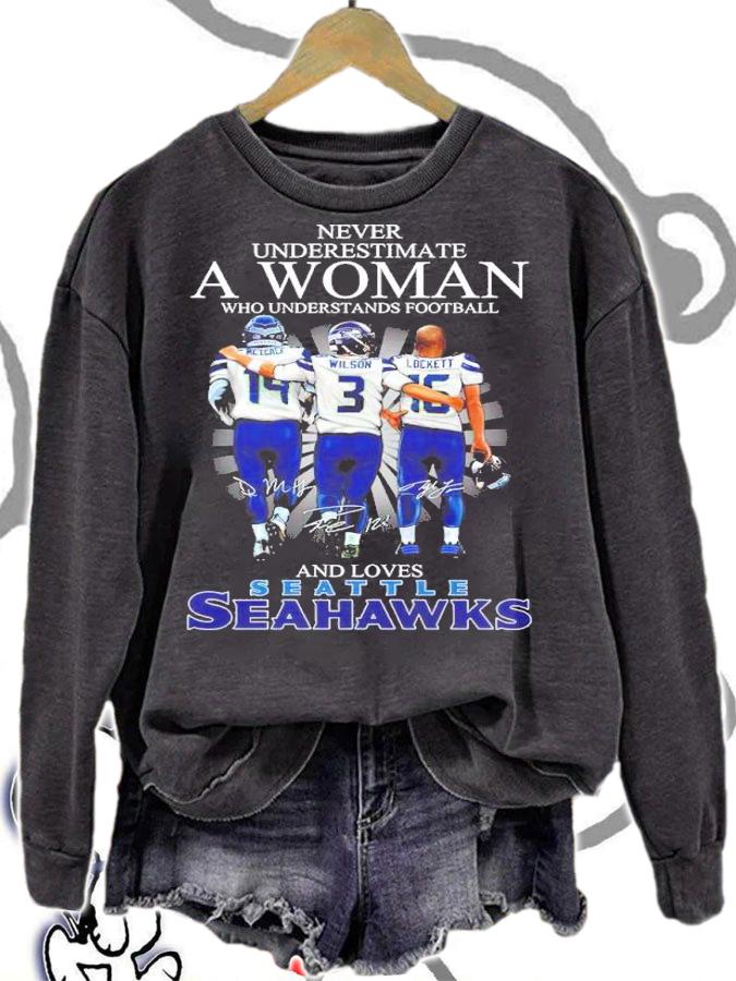Never Underestimate A Woman Who Understands Football And Loves Seattle Seahawks Shirt sweatshirt