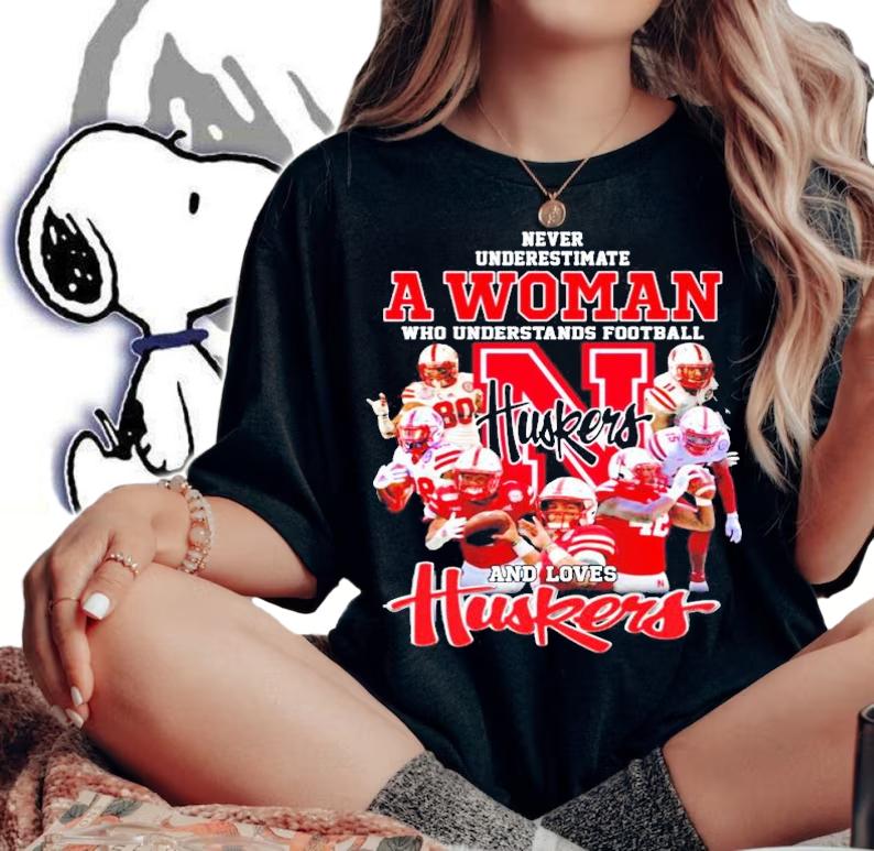 Huskers never underestimate a woman who understands football and love shirt